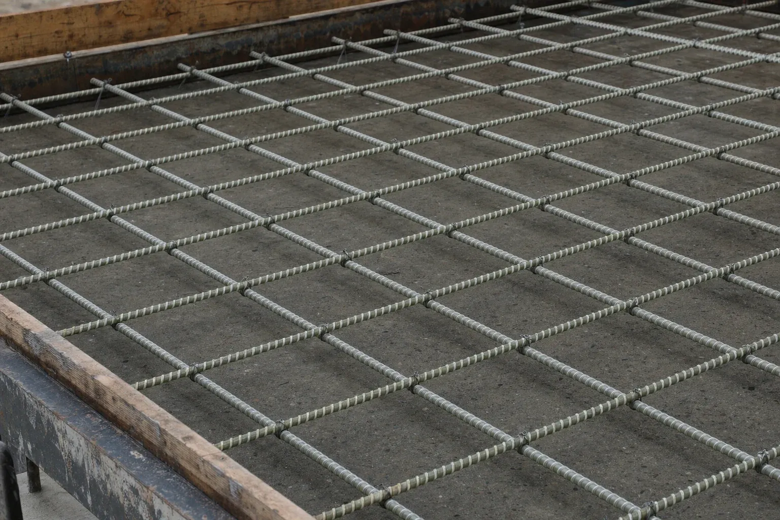 GFRP reinforcement mat tied in formwork before casting